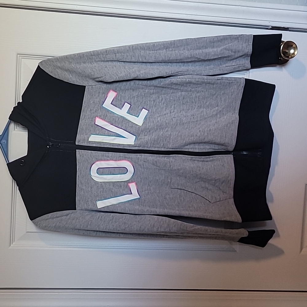 Size small. Cute,zippered, sweater with hoodie.
